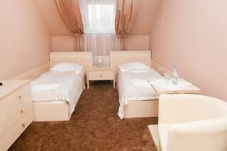 Отель Hotel Hibiskus Boguchwała Двухместный номер с 2 отдельными кроватями-6